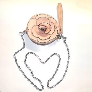 NWOT Cute small light pink, leather rose purse/wallet. Never used.